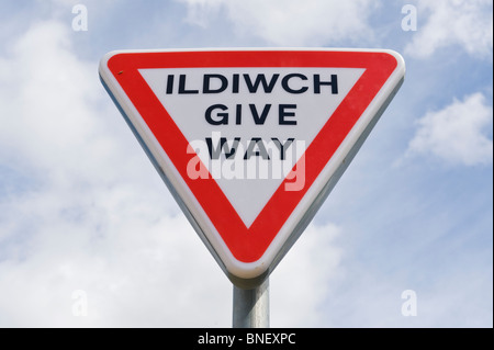 Bilingual Welsh English language GIVE WAY road sign UK Wales` Stock Photo